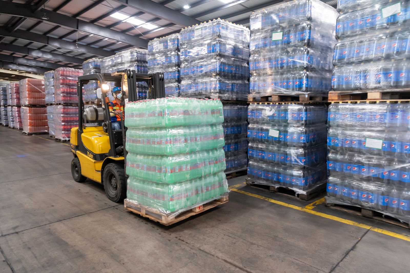 Pallet racking in a wholesale distribution warehouse
